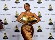 Victoria Monét poses in the press room with her three GRAMMY Awards (Photo by Alberto E. Rodriguez/Getty Images for The Recording Academy)